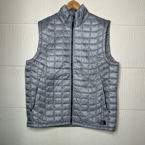 The North Face Men’s Light Gray Quilted Down Vest Size Large.